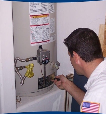 Water heater pilot light bering relit in Glendale, AZ