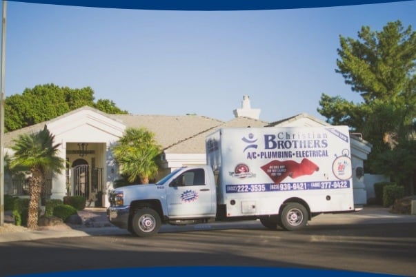 Christian Brothers Truck in Front of House